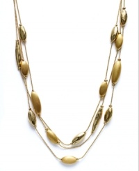 Layers of golden accents stack up classic style on Charter Club's four-row necklace. Finished with a toggle closure. Crafted in brushed gold tone mixed metal. Approximate length: 18 inches. Approximate drop: 3/4 inch. Layers of golden accents stack up classic style on Charter Club's four-row necklace. Finished with a toggle closure. Crafted in brushed gold tone mixed metal. Approximate length: 18 inches. Approximate drop: 3/4 inch.