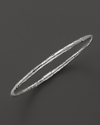 From the Silver Collection, a bold sterling silver hammered bangle. Designed by Ippolita. From the Silver Collection, a bold sterling silver hammered bangle. Designed by Ippolita.