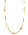 Rich, luxurious layers that can be worn long or doubled up. This chic Lauren Ralph Lauren necklace features intricate hammered discs in worn gold tone mixed metal. Approximate length: 60 inches.