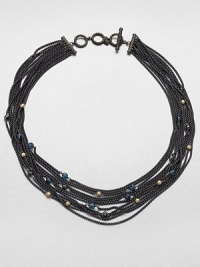 Delicate chains of blackened sterling silver are randomly sprinkled with tiny faceted beads of blue topaz, hematite and 18k gold in this dramatic design.Blue topaz and hematiteSterling silver and 18k yellow goldLength, about 18Cable toggle closureImported Delicate chains of blackened sterling silver are randomly sprinkled with tiny faceted beads of blue topaz, hematite and 18k gold in this dramatic design.Blue topaz and hematiteSterling silver and 18k yellow goldLength, about 18Cable toggle closureImported