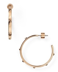 Strong but simple. This pair of rose gold plated hoop earrings from Michael Kors are the perfect earrings for everyday - wear them as as shapely showpiece. Strong but simple. This pair of rose gold plated hoop earrings from Michael Kors are the perfect earrings for everyday - wear them as as shapely showpiece.