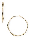 Delicately twisted, this pair of hoop earrings from Aqua is a sophisticated take on a classic style. Make them part of your 24/7 collection to add a simple touch to every look.