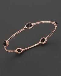 From the Rosé collection, five smoky quartz stations on a hammered bangle. Designed by Ippolita. From the Rosé collection, five smoky quartz stations on a hammered bangle. Designed by Ippolita.