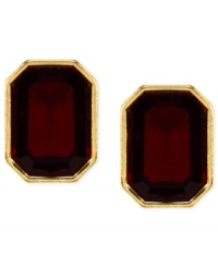Red and gold lend a look of vibrant elegance. These stud earrings from Anne Klein features faceted red stones in a golden setting. Crafted in gold tone mixed metal. Approximate diameter: 1/2 inch. Red and gold lend a look of vibrant elegance. These stud earrings from Anne Klein features faceted red stones in a golden setting. Crafted in gold tone mixed metal. Approximate diameter: 1/2 inch.