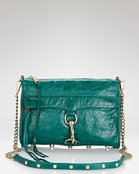 Antique-finish metal hardware adds to the luxe appeal of this leather clutch from Rebecca Minkoff. Antique-finish metal hardware adds to the luxe appeal of this leather clutch from Rebecca Minkoff.