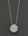 A stunning diamond cluster is bezel-set in 14K white gold.