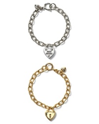 Just what she wants this year... a Juicy Couture starter bracelet that comes the perfect first charm:a puffy heart lock. Shown with iconic Juicy script and glass crystal accents. Just what she wants this year... a Juicy Couture starter bracelet that comes the perfect first charm:a puffy heart lock. Shown with iconic Juicy script and glass crystal accents.
