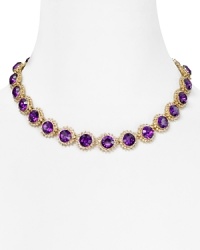 With a bold sunburst stone design, this on-trend collar necklace will be your go-to statement piece all season long. With a bold sunburst stone design, this on-trend collar necklace will be your go-to statement piece all season long.