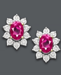 Add a pop of color. These regal and rich-looking stud earrings highlight oval-cut rubies (1-1/3 ct. t.w.) encircled by round-cut diamonds (5/8 ct. t.w.). Crafted in 10k gold. Approximate diameter: 3/8 inch. Add a pop of color. These regal and rich-looking stud earrings highlight oval-cut rubies (1-1/3 ct. t.w.) encircled by round-cut diamonds (5/8 ct. t.w.). Crafted in 10k gold. Approximate diameter: 3/8 inch.