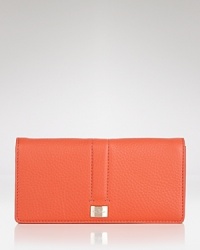 Elevate your essentials with Cole Haan's leather wallet, boasting spots for your coins, cards and cash. Take (bank) note: this accessory packs a color-pop. Elevate your essentials with Cole Haan's leather wallet, boasting spots for your coins, cards and cash. Take (bank) note: this accessory packs a color-pop.