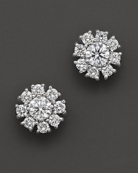 White gold diamond flower cluster earrings. With signature ruby accent. Designed by Roberto Coin. White gold diamond flower cluster earrings. With signature ruby accent. Designed by Roberto Coin.