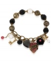 The key to your heart, this multi-charm half stretch bracelet from Betsey Johnson truly dazzles. It's crafted from antique gold-tone mixed metal with glass pearls and sparkling accents. Item comes packaged in a signature Betsey Johnson Gift Box. Approximate length: 7-1/2 inches.