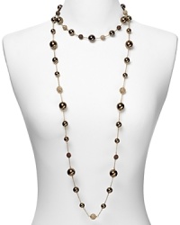 Embellished with delicate pearl and crystal stations, Carolee's illusion necklace sparkles with versatility -- elegant whether worn to dress up denim or enliven a classic white blouse. Embellished with delicate pearl and crystal stations, Carolee's illusion necklace sparkles with versatility -- elegant whether worn to dress up denim or enliven a classic white blouse.