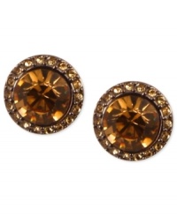 Smoky sophistication stands out on Givenchy's stud earrings. A light Colorado topaz glass stone is surrounded by pave accents. Crafted in brown gold tone mixed metal. Approximate diameter: 1-1/2 inches. Smoky sophistication stands out on Givenchy's stud earrings. A light Colorado topaz glass stone is surrounded by pave accents. Crafted in brown gold tone mixed metal. Approximate diameter: 1-1/2 inches.