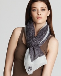 Go wild for this leopard printed scarf with a light blue contrast border. Go wild for this leopard printed scarf with a light blue contrast border.