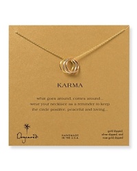 Believe in the power of threes with Dogeared's karma ring-trimmed necklace. Slip this meaningful token on as a reminder that what comes around, goes around. Believe in the power of threes with Dogeared's karma ring-trimmed necklace. Slip this meaningful token on as a reminder that what comes around, goes around.