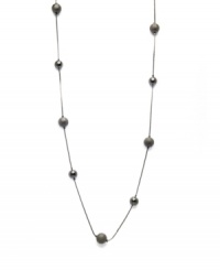 Alfani's long station necklace is sure to be a diverse, dramatic look within your jewelry collection. Crafted in hematite tone mixed metal. Approximate length: 42 inches. Alfani's long station necklace is sure to be a diverse, dramatic look within your jewelry collection. Crafted in hematite tone mixed metal. Approximate length: 42 inches.