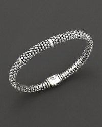 Sterling silver Caviar™ beaded oval rope bracelet with five smooth stations. Logo box clasp closure. Designed by Lagos. Sterling silver Caviar™ beaded oval rope bracelet with five smooth stations. Logo box clasp closure. Designed by Lagos.