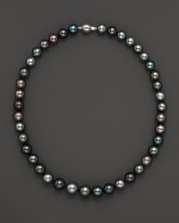 Darkly shimmering Tahitian pearls with 14K. white gold. Darkly shimmering Tahitian pearls with 14K. white gold.