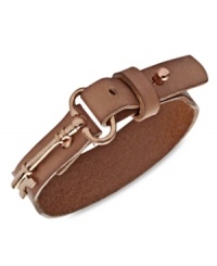 Lock up your new favorite bracelet with this key-charm wrist wrap from Fossil. Crafted with nude-colored leather. Finished with an adjustable peg closure. Approximate length: 9-1/2 inches. Lock up your new favorite bracelet with this key-charm wrist wrap from Fossil. Crafted with nude-colored leather. Finished with an adjustable peg closure. Approximate length: 9-1/2 inches.