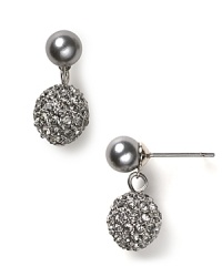 Glittering pave ball drop earrings from Carolee Lux add instant head-turning appeal. Glittering pave ball drop earrings from Carolee Lux add instant head-turning appeal.
