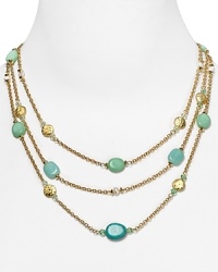 Embellished with striking turquoise beads and hammered stations, Lauren Ralph Lauren's link necklace is a striking adornment. Layer it over a crisp collar for a cool contrast. Embellished with striking turquoise beads and hammered stations, Lauren Ralph Lauren's link necklace is a striking adornment. Layer it over a crisp collar for a cool contrast.
