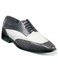 This pair of men's dress shoes from Stacy Adams puts an exotic twist on a formal standard with these printed leather oxfords, making them a cool complement to any guy's tailored collection. This pair of men's dress shoes from Stacy Adams puts an exotic twist on a formal standard with these printed leather oxfords, making them a cool complement to any guy's tailored collection.