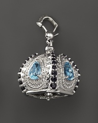 Inspired by Zen philosophy, this polished sterling silver Raja meditation bell from Paul Morelli is set with blue topaz and black spinel. Inspired by Zen philosophy, this polished sterling silver Raja meditation bell from Paul Morelli is set with blue topaz and black spinel.
