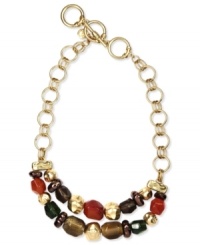 Jones New York's colorful cluster necklace features a two-row frontal design embellished with resin beads. Crafted from worn gold tone mixed metal. Approximate length: 17 inches + 3-inch extender. Jones New York's colorful cluster necklace features a two-row frontal design embellished with resin beads. Crafted from worn gold tone mixed metal. Approximate length: 17 inches + 3-inch extender.