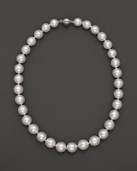 Cultured South Sea pearls in soft white join at a 14K white gold clasp. Cultured South Sea pearls in soft white join at a 14K white gold clasp.