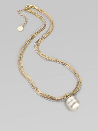 A single white baroque pearl hangs gracefully from delicate chains of 18k rose and yellow gold vermeil, and sterling silver. 16mm white organic man-made pearl Length, about 16 with 2 extender Lobster clasp Made in Spain A single white baroque pearl hangs gracefully from delicate chains of 18k rose and yellow gold vermeil, and sterling silver. 16mm white organic man-made pearl Length, about 16 with 2 extender Lobster clasp Made in Spain