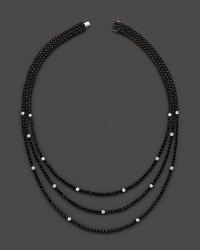 Faceted black sapphires, punctuated by diamonds, form three dazzling strands. By Roberto Coin. Faceted black sapphires, punctuated by diamonds, form three dazzling strands. By Roberto Coin.