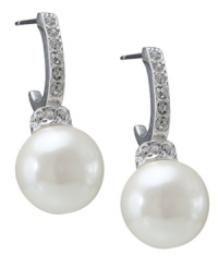 Channel sheer elegance with simple drops by Carolee. Pave crystal covered hoops feature a petite glass pearl drop. Crafted in mixed metal. Approximate drop: 1/8 inch. Channel sheer elegance with simple drops by Carolee. Pave crystal covered hoops feature a petite glass pearl drop. Crafted in mixed metal. Approximate drop: 1/8 inch.