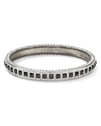 Oh so flipped out, this Rebecca Minkoff bangle works a decidedly downtown vibe, crafted of silver plated metal. Oh so flipped out, this Rebecca Minkoff bangle works a decidedly downtown vibe, crafted of silver plated metal.