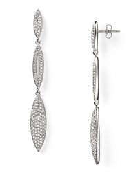 Pave-set crystals and an delicate, linear design make these rhodium-plated earrings from Nadri a stunning choice. Wear them to elevate evening looks. Pave-set crystals and an delicate, linear design make these rhodium-plated earrings from Nadri a stunning choice. Wear them to elevate evening looks.