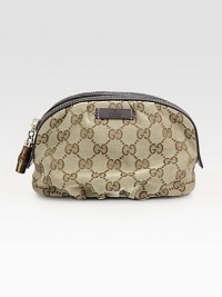 Timeless GG jacquard crafted in a top-zip bag with leather trim.Top zip closureOne inside open pocketFully lined7½W X 5½H X 3DMade in Italy Timeless GG jacquard crafted in a top-zip bag with leather trim.Top zip closureOne inside open pocketFully lined7½W X 5½H X 3DMade in Italy