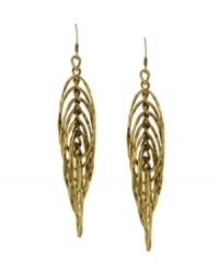 Shape up in style that makes an artistic statement. These chic drop earrings by BCBGeneration highlight multiple cut-out ovals in an overlapping pattern. Crafted in antique gold tone mixed metal. Approximate drop: 3 inches. Shape up in style that makes an artistic statement. These chic drop earrings by BCBGeneration highlight multiple cut-out ovals in an overlapping pattern. Crafted in antique gold tone mixed metal. Approximate drop: 3 inches.