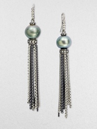 From the Midnight Pearl Collection. Gleaming chain tassels of blackened sterling silver dangle delicately from iridescent Tahitian cultured pearls with bands of diamonds above and below.Diamonds, .34 tcwTahitian pearls, 11mm-12mmSterling silverLength, about 3Ear wireImported From the Midnight Pearl Collection. Gleaming chain tassels of blackened sterling silver dangle delicately from iridescent Tahitian cultured pearls with bands of diamonds above and below.Diamonds, .34 tcwTahitian pearls, 11mm-12mmSterling silverLength, about 3Ear wireImported