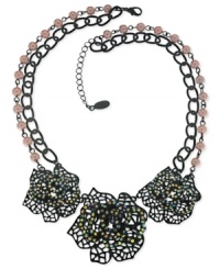 Flower power. This two-row necklace, crafted from sprayed-jet-tone mixed metal, by GUESS features three flower accents for more beauty in bloom. Glass crystal stones add a sparkling touch. Approximate length: 16 inches + 2-inch extender. Approximate drop: 2 inches. Flower power. This two-row necklace, crafted from sprayed-jet-tone mixed metal, by GUESS features three flower accents for more beauty in bloom. Glass crystal stones add a sparkling touch. Approximate length: 16 inches + 2-inch extender. Approximate drop: 2 inches.