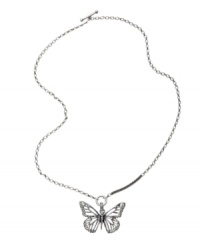 Decorate your neckline with natural style. This beautiful openwork butterfly pendant by Fossil features a silver tone mixed metal setting with clear crystal details. Necklace chain can be worn long or short. Approximate length: 16 to 32 inches. Approximate drop: 1-3/4 inches. Decorate your neckline with natural style. This beautiful openwork butterfly pendant by Fossil features a silver tone mixed metal setting with clear crystal details. Necklace chain can be worn long or short. Approximate length: 16 to 32 inches. Approximate drop: 1-3/4 inches.