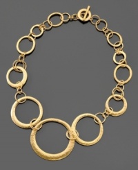 Stand out in a crowd. This gorgeous Lauren by Ralph Lauren circle necklace is crafted in goldtone mixed metal. Approximate length: 18 inches. Stand out in a crowd. This gorgeous Lauren by Ralph Lauren circle necklace is crafted in goldtone mixed metal. Approximate length: 18 inches.