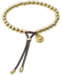 Inspire your look with one of the latest celebrity trends. Michael Kors' beautifully-beaded good luck bracelet is crafted in gold tone mixed metal with an adjustable brown leather clasp. Bracelet also stretches to fit wrist. Approximate diameter: 2-1/2 inches. Inspire your look with one of the latest celebrity trends. Michael Kors' beautifully-beaded good luck bracelet is crafted in gold tone mixed metal with an adjustable brown leather clasp. Bracelet also stretches to fit wrist. Approximate diameter: 2-1/2 inches.