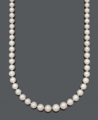 Celebrate traditional sophistication with a beautiful strand of pearls. Belle de Mer necklace features a graduated strand of A+ cultured freshwater pearls (8-12 mm) with a 14k gold clasp. Approximate length: 18 inches. Celebrate traditional sophistication with a beautiful strand of pearls. Belle de Mer necklace features a graduated strand of A+ cultured freshwater pearls (8-12 mm) with a 14k gold clasp. Approximate length: 18 inches.