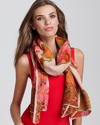 Go for bohemian style with this vibrant scarf featuring an intricate circular pattern. Go for bohemian style with this vibrant scarf featuring an intricate circular pattern.