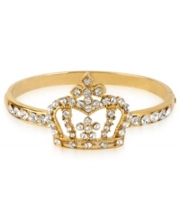 Rise to the throne with this regal hinge bangle bracelet from Betsey Johnson. A crown design is prettied up with crystal accents. Includes signature gift box (4 diameter). Crafted in antique gold tone mixed metal. Approximate diameter: 2-1/3 inches. Rise to the throne with this regal hinge bangle bracelet from Betsey Johnson. A crown design is prettied up with crystal accents. Includes signature gift box (4 diameter). Crafted in antique gold tone mixed metal. Approximate diameter: 2-1/3 inches.