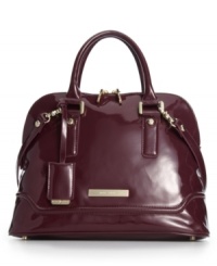 Live the luxe life with with this irresistible silhouette from Ivanka Trump. Adorned with gleaming golden hardware and signature detailing, it boasts plenty of pockets and compartments for superb organization within. Live the luxe life with with this irresistible silhouette from Ivanka Trump. Adorned with gleaming golden hardware and signature detailing, it boasts plenty of pockets and compartments for superb organization within.