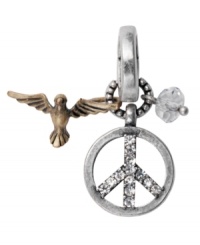 Give peace a fighting chance. Fossil's charm shows how much care with a crystal pave peace sign in silvertone and goldtone sparrow. Crafted in mixed metal. Approximate drop: 1-1/2 inches. Give peace a fighting chance. Fossil's charm shows how much care with a crystal pave peace sign in silvertone and goldtone sparrow. Crafted in mixed metal. Approximate drop: 1-1/2 inches.