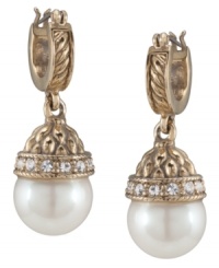 A traditional and timeless piece, Carolee's hoop earrings offer an extra hint of shimmer with white glass pearls and sparkling glass accents. Set in antique gold-plated mixed metal. Approximate drop: 1-1/2 inches. A traditional and timeless piece, Carolee's hoop earrings offer an extra hint of shimmer with white glass pearls and sparkling glass accents. Set in antique gold-plated mixed metal. Approximate drop: 1-1/2 inches.