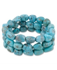 Organically appealing. The earthy turquoise nuggets adorning Avalonia Road's charming stretch bracelet make it an instant favorite for warm-weather ensembles. Closure crafted in sterling silver. Approximate diameter: 4 inches. Approximate length: 7-1/2 inches. Organically appealing. The earthy turquoise nuggets adorning Avalonia Road's charming stretch bracelet make it an instant favorite for warm-weather ensembles. Closure crafted in sterling silver. Approximate diameter: 4 inches. Approximate length: 7-1/2 inches.