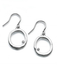 A tiny crystal accent rests in an imperfect circle on this stylish Kenneth Cole New York earrings. Crafted in silvertone mixed metal. Approximate drop: 1 inch. A tiny crystal accent rests in an imperfect circle on this stylish Kenneth Cole New York earrings. Crafted in silvertone mixed metal. Approximate drop: 1 inch.